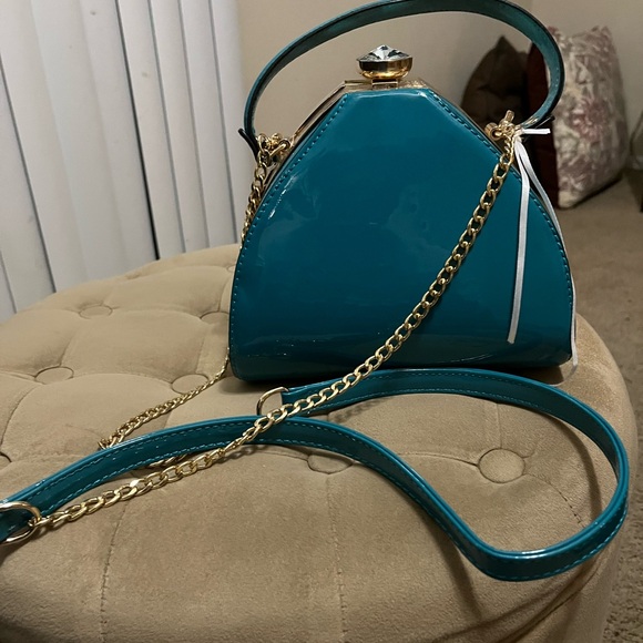 Elegant Teal Handbag
**Never used** - Picture 2 of 8
